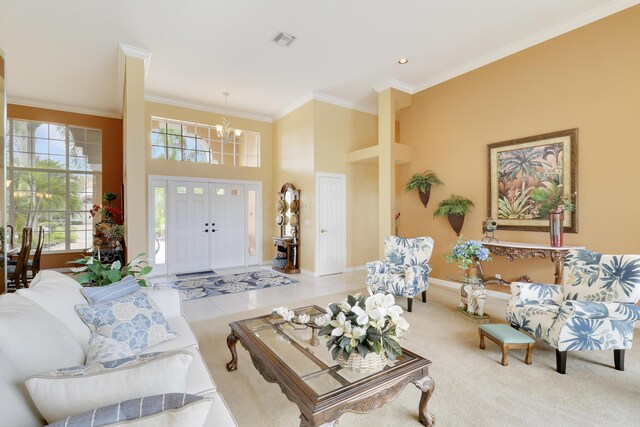 carpeted living room featuring crown molding and an inviting chandelier