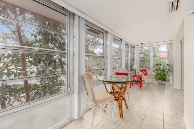 sunroom with plenty of natural light