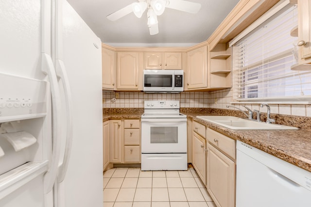 kitchen featuring ceiling fan, sink, crown molding, white appliances, and light tile patterned floors