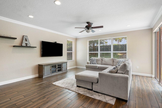 living room featuring a textured ceiling, ceiling fan, crown molding, and dark hardwood / wood-style floors