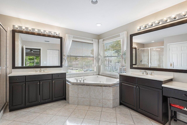 bathroom with vanity, tile patterned floors, and independent shower and bath