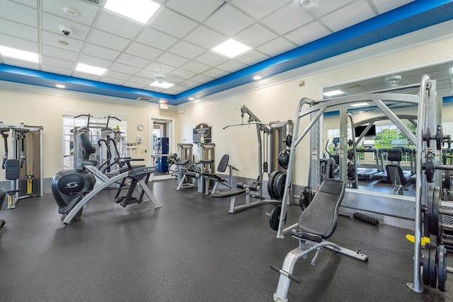 exercise room featuring a drop ceiling