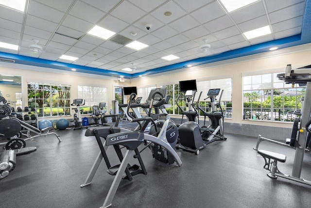 workout area featuring a paneled ceiling