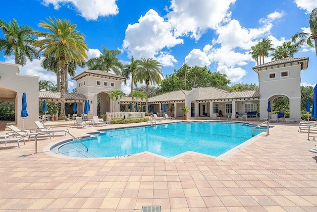 view of swimming pool with a patio area