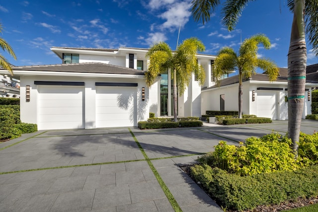 view of front of property featuring a garage