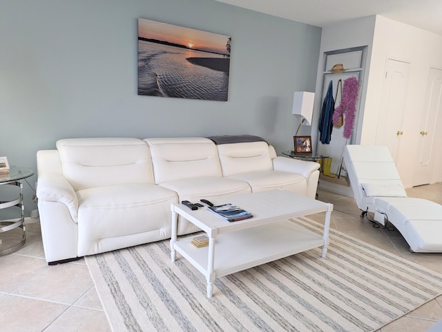 living room with light tile patterned flooring