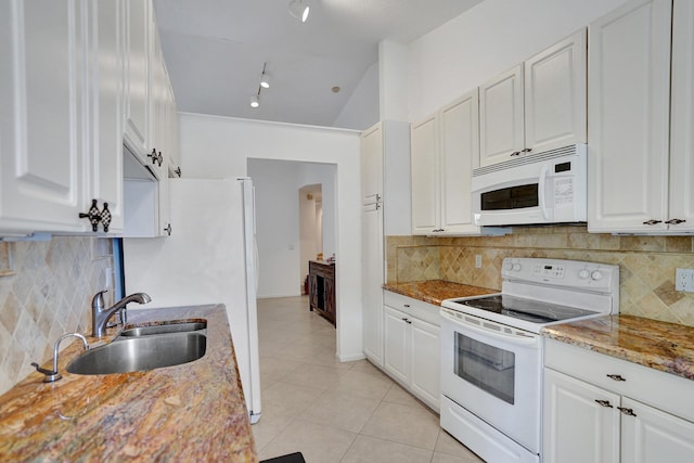 kitchen featuring white cabinets, white appliances, light stone countertops, and sink