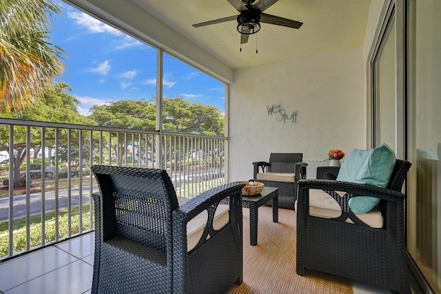 sunroom / solarium with ceiling fan