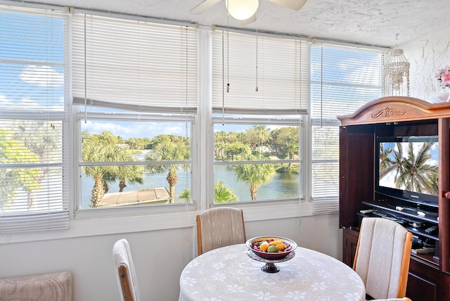 dining room featuring ceiling fan