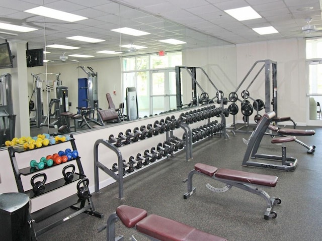 exercise room featuring a paneled ceiling