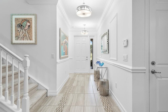 tiled entryway with ornamental molding