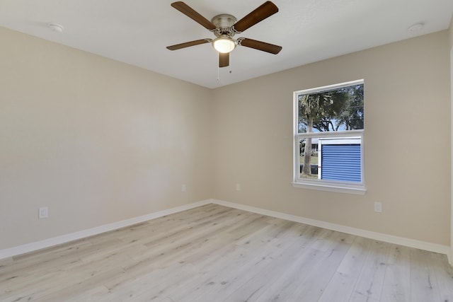 spare room with ceiling fan and light hardwood / wood-style flooring