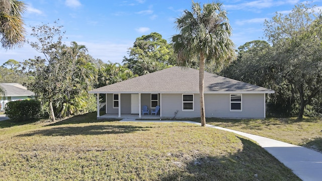 ranch-style house with a front lawn