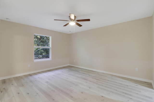 empty room with light hardwood / wood-style floors