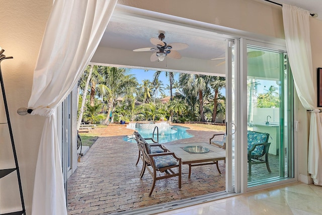 exterior space featuring a patio and ceiling fan