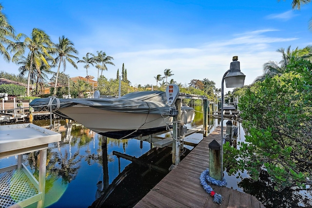 view of dock with a water view