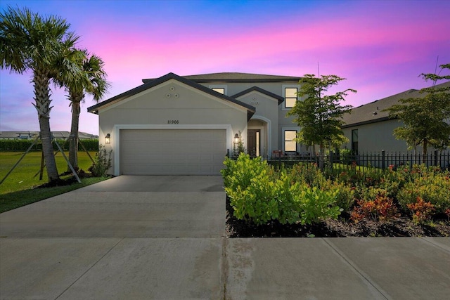 view of front of home with a garage