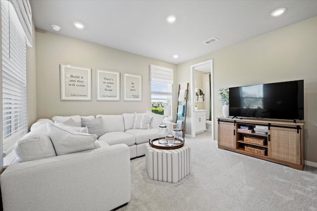 11966 SW Macelli Way, Port Saint Lucie, FL 34987 - living area featuring carpet floors, recessed lighting, and baseboards