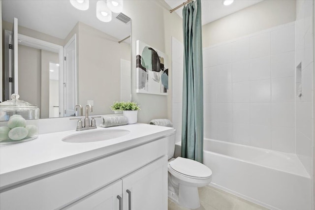 full bathroom with tile patterned flooring, vanity, toilet, and shower / bath combo with shower curtain