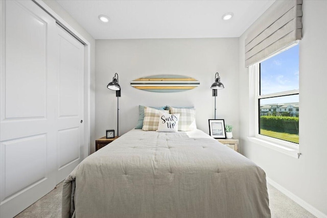 bedroom featuring a closet and carpet