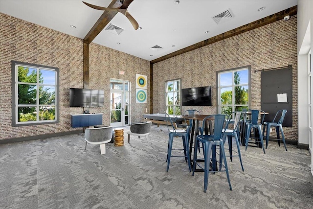 interior space featuring ceiling fan