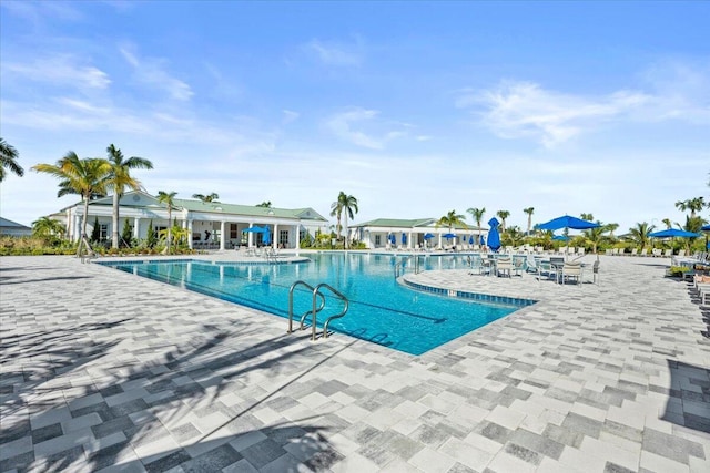 view of swimming pool featuring a patio area