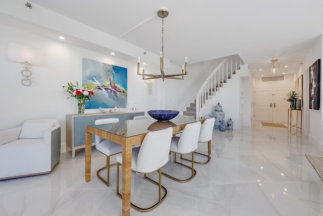 dining room featuring a notable chandelier