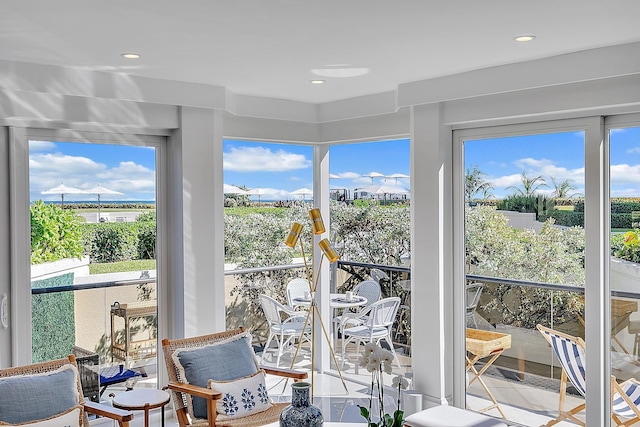 sunroom / solarium featuring a wealth of natural light