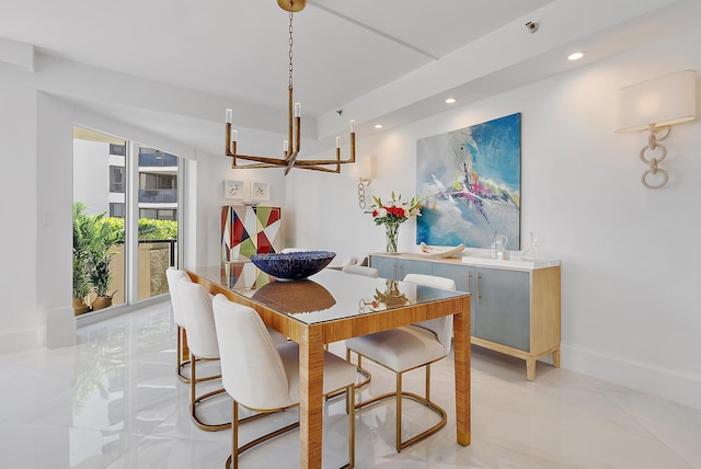 dining room featuring a notable chandelier