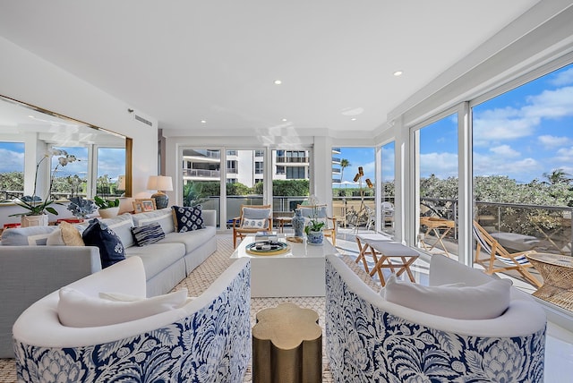 living room featuring a wealth of natural light