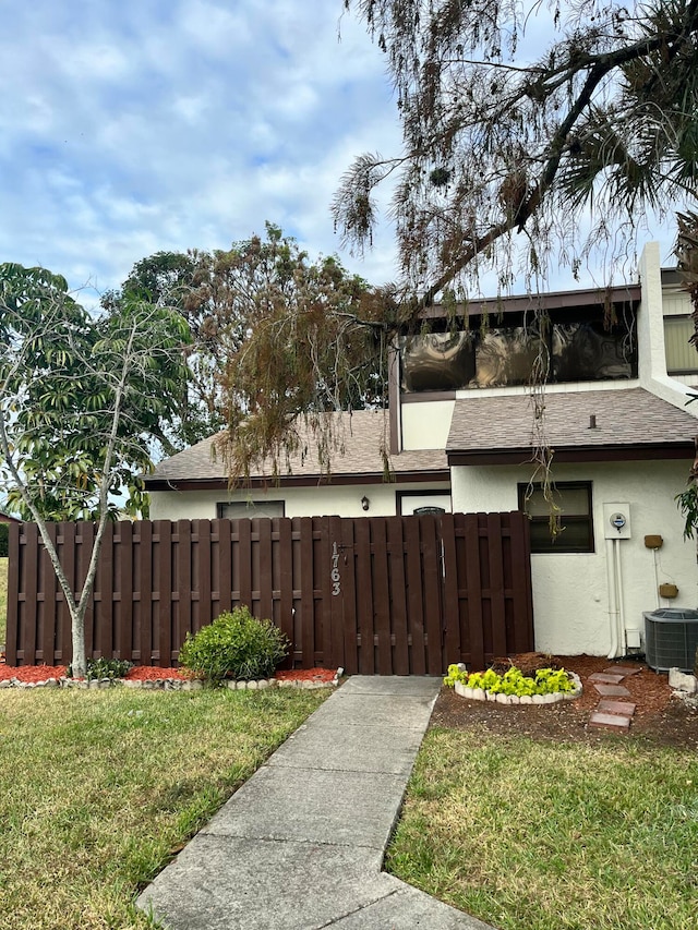 view of yard with central AC