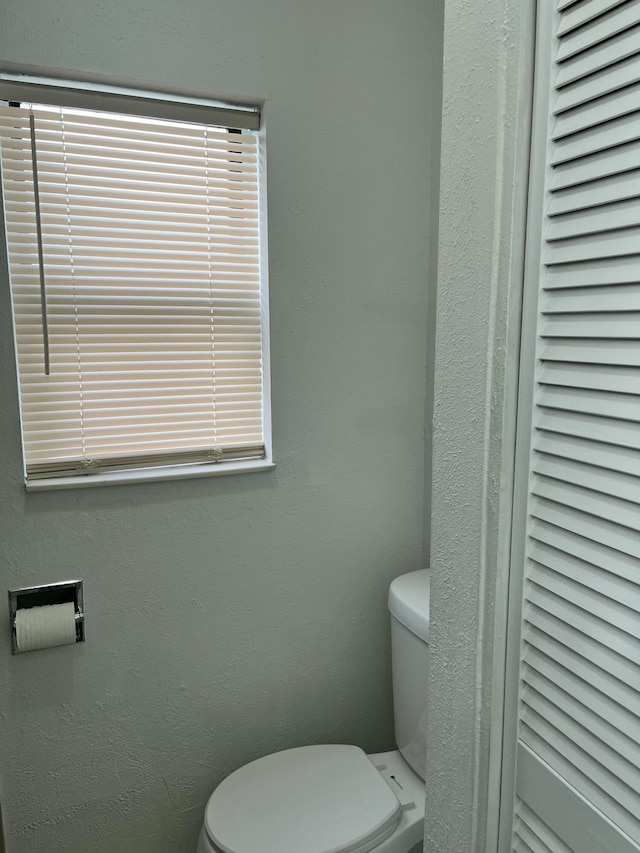 bathroom featuring toilet