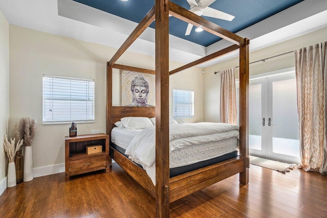 bedroom featuring ceiling fan, hardwood / wood-style floors, and french doors