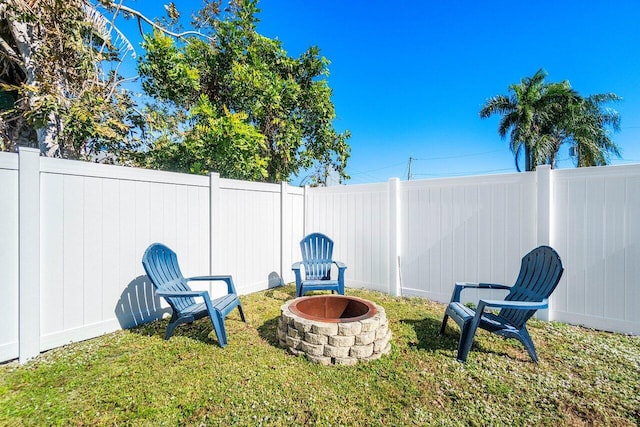 view of yard featuring a fire pit