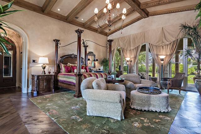 bedroom with beamed ceiling and high vaulted ceiling