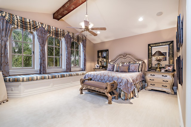 bedroom featuring lofted ceiling with beams, ceiling fan, and carpet floors