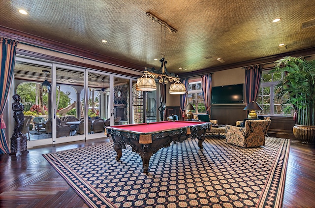 playroom featuring a textured ceiling, a healthy amount of sunlight, and pool table