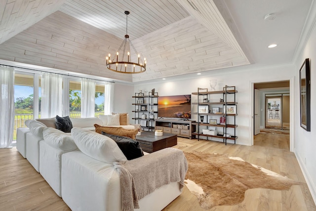 living room featuring wooden ceiling, light hardwood / wood-style flooring, a chandelier, vaulted ceiling, and ornamental molding