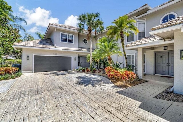 view of front of property with a garage