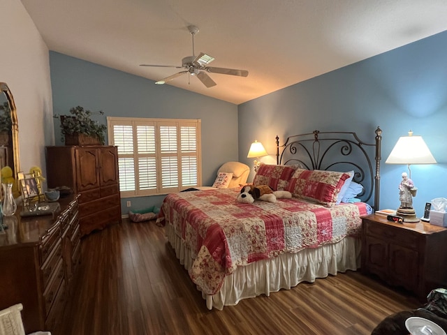 bedroom with ceiling fan, dark hardwood / wood-style flooring, and vaulted ceiling