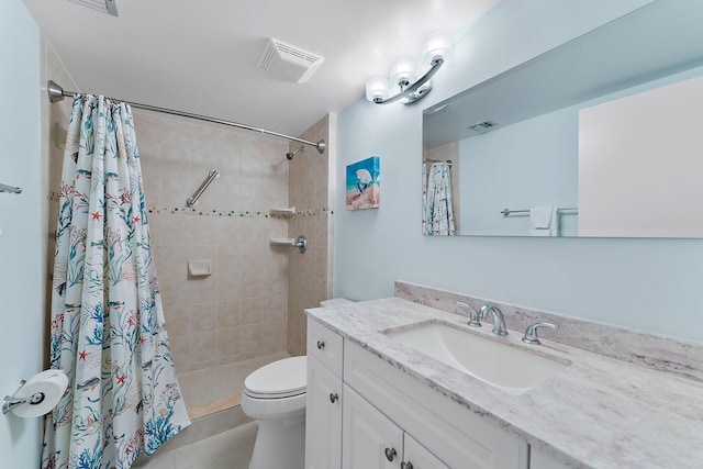 bathroom with tile patterned floors, vanity, toilet, and a shower with shower curtain