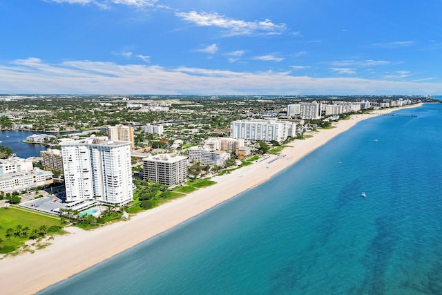 aerial view featuring a view of the beach and a water view