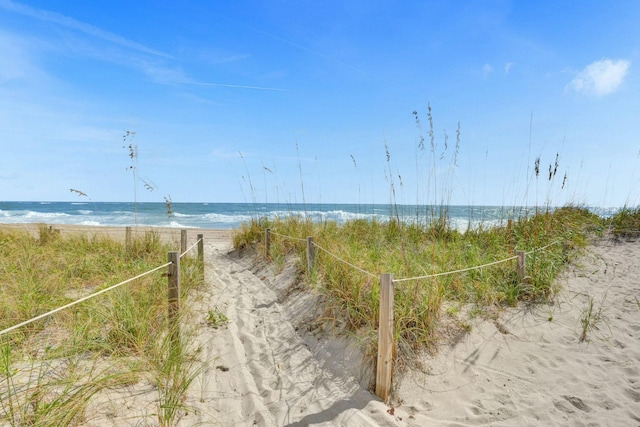 property view of water featuring a view of the beach