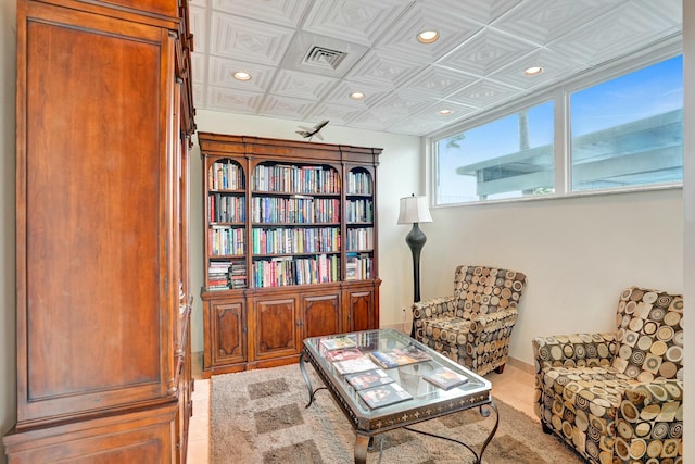 living area with light tile patterned floors