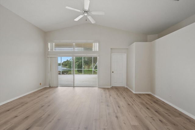 spare room featuring high vaulted ceiling, light hardwood / wood-style floors, and ceiling fan