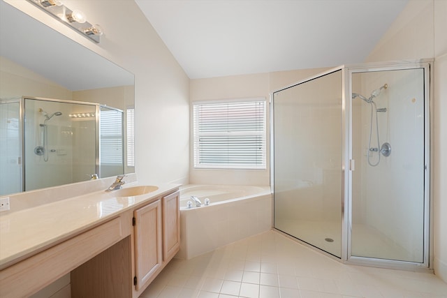 bathroom featuring separate shower and tub, tile patterned flooring, vanity, and vaulted ceiling