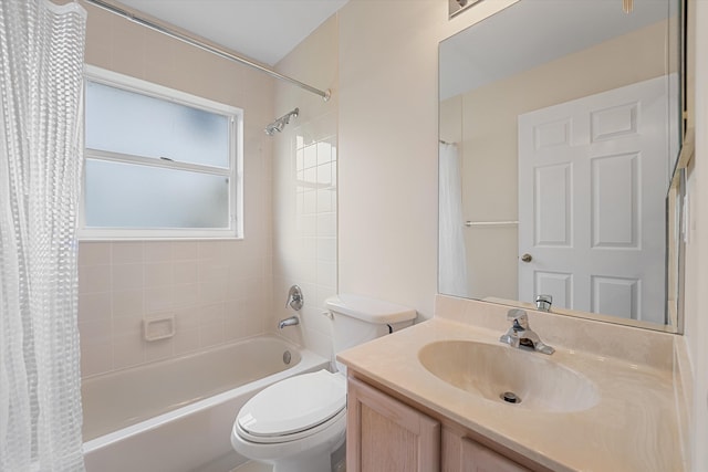 full bathroom with vanity, toilet, and shower / bath combo with shower curtain