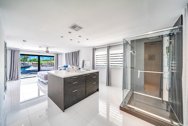 bathroom with vanity and tile patterned floors