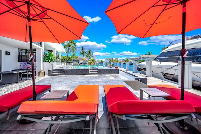 view of patio / terrace featuring a water view