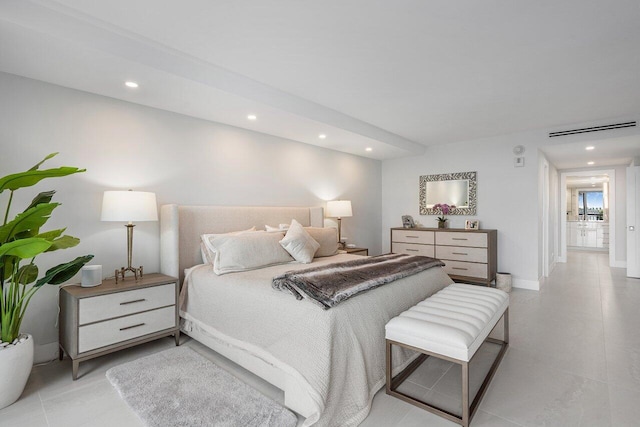 bedroom with light tile patterned flooring